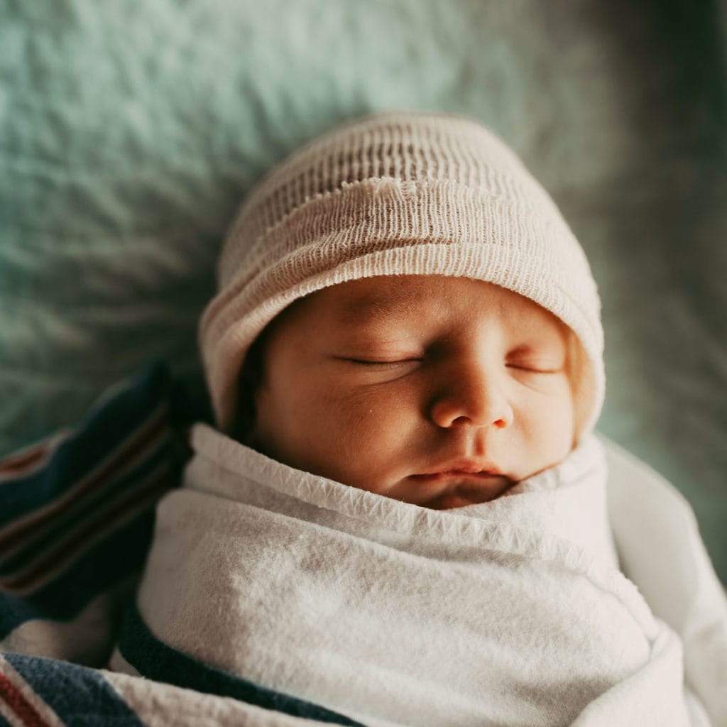 Orlando Fresh 48 Newborn Photography, little baby swaddled up with beanie on