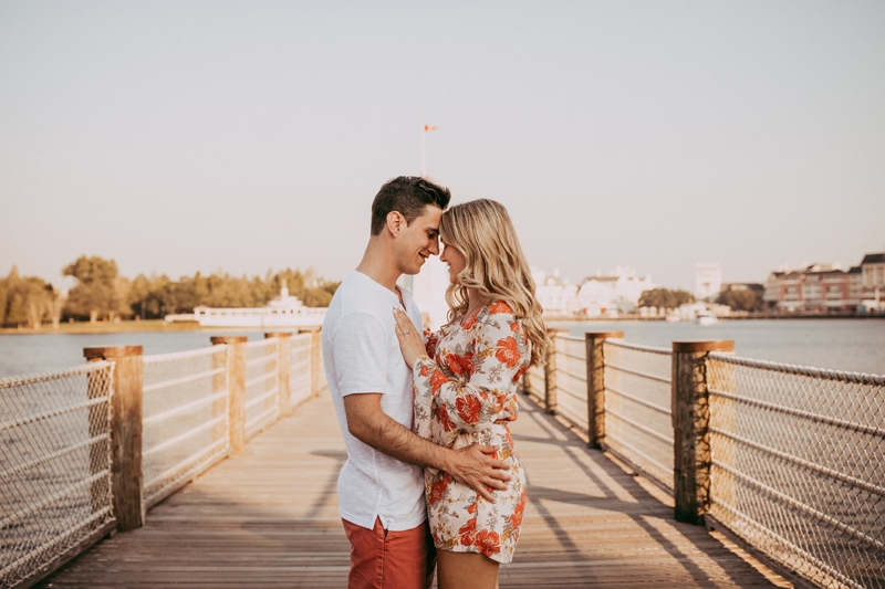 Orlando Couples Photography, couple standing on a dock, holding each other
