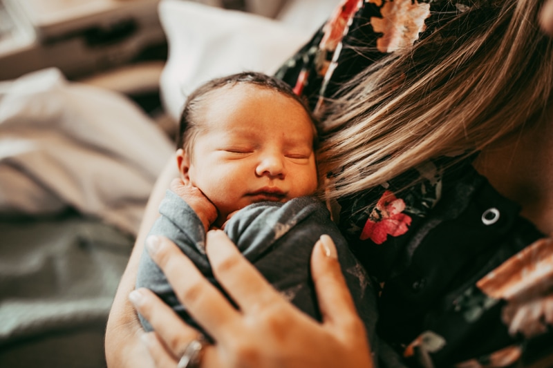 Orlando Fresh 48 Photographer, sleeping newborn in mother's arms